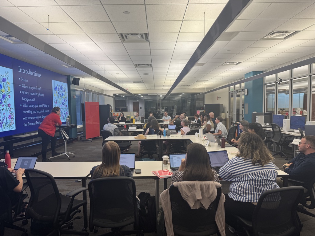 participants in the Summer Institute gather for a session in the Digital Matters lab