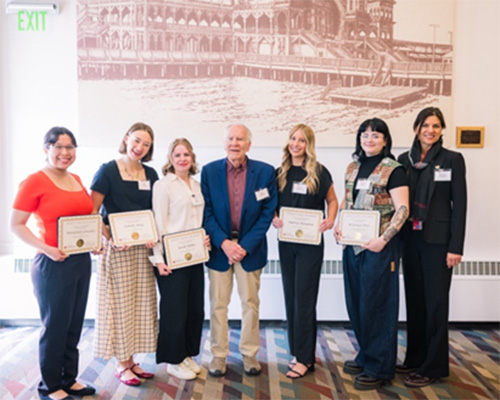 Recipients of the Francis Family scholarship holding their certificates